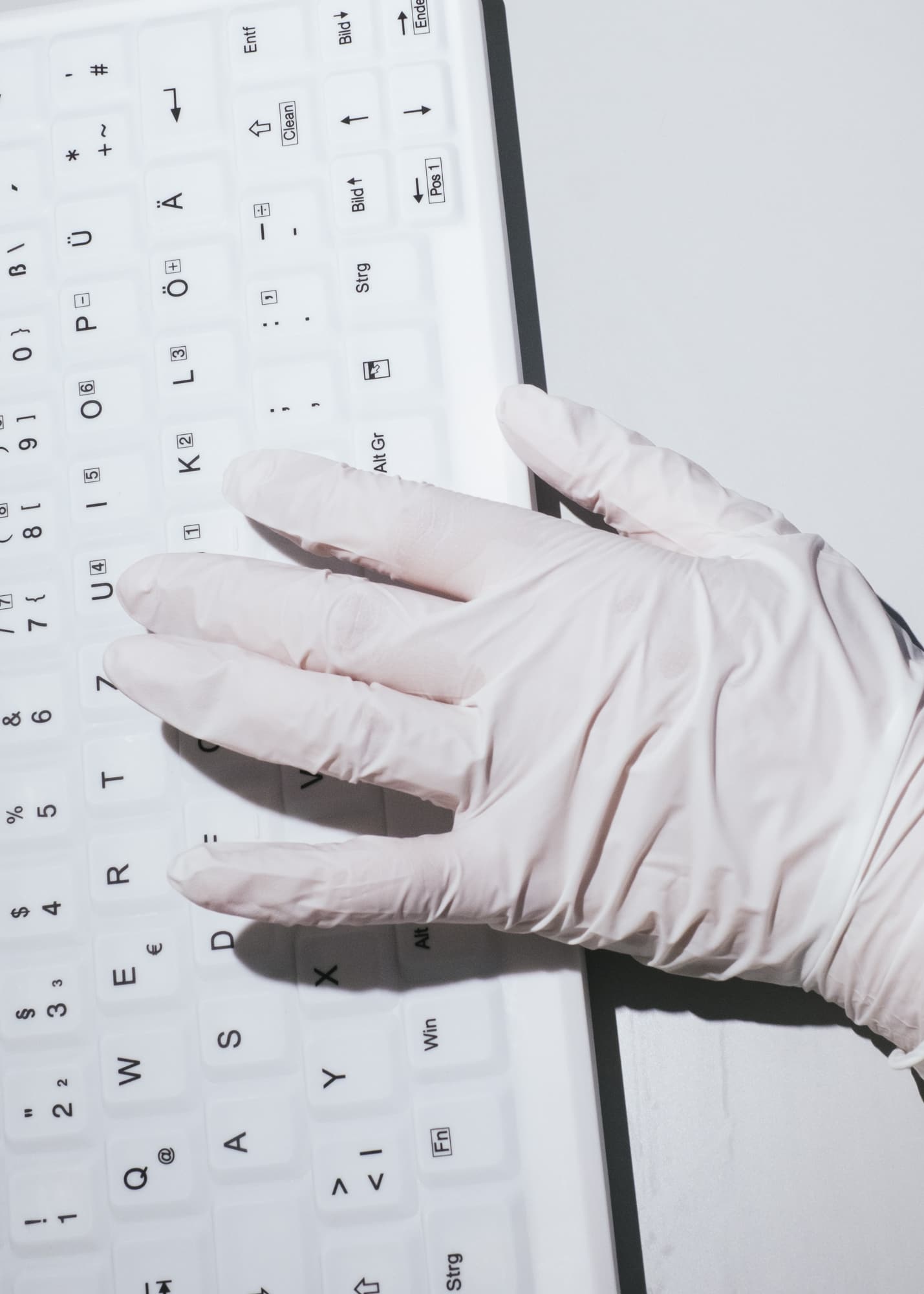 Nicht muede werden — Hand detail of a nurse typing on a computer