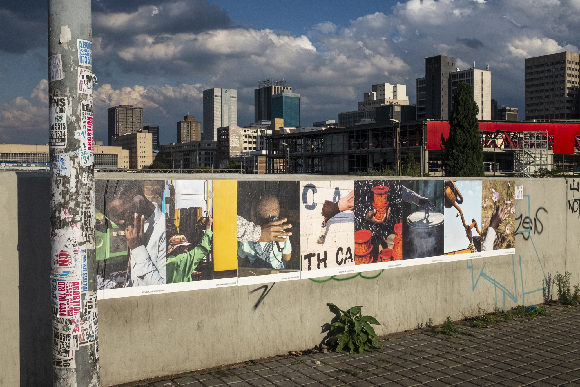 Documentation of the street art exhibition of "How to get home" in Johannesburg, South Africa, November 2019, funded by the Stiftung Kulturwerk Grant.   Poster set in Johannesburg CBD, Queen Elizabeth Bridge on Nov 23rd, 2019.